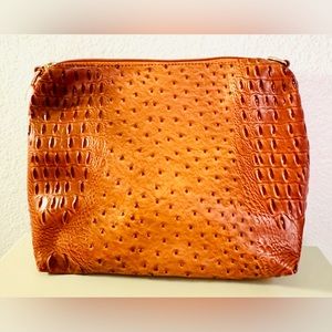 Like New crocodile faux leather crossbody bag with detachable strap.